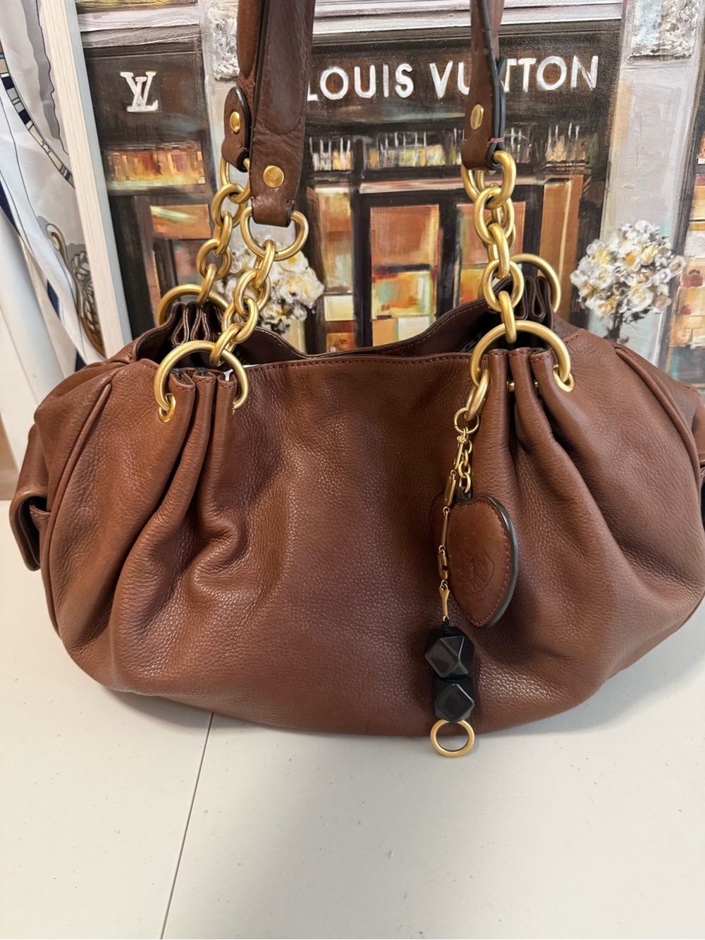 Juicy Couture Brown Leather Shoulder Bag with Gold Chain Accents
